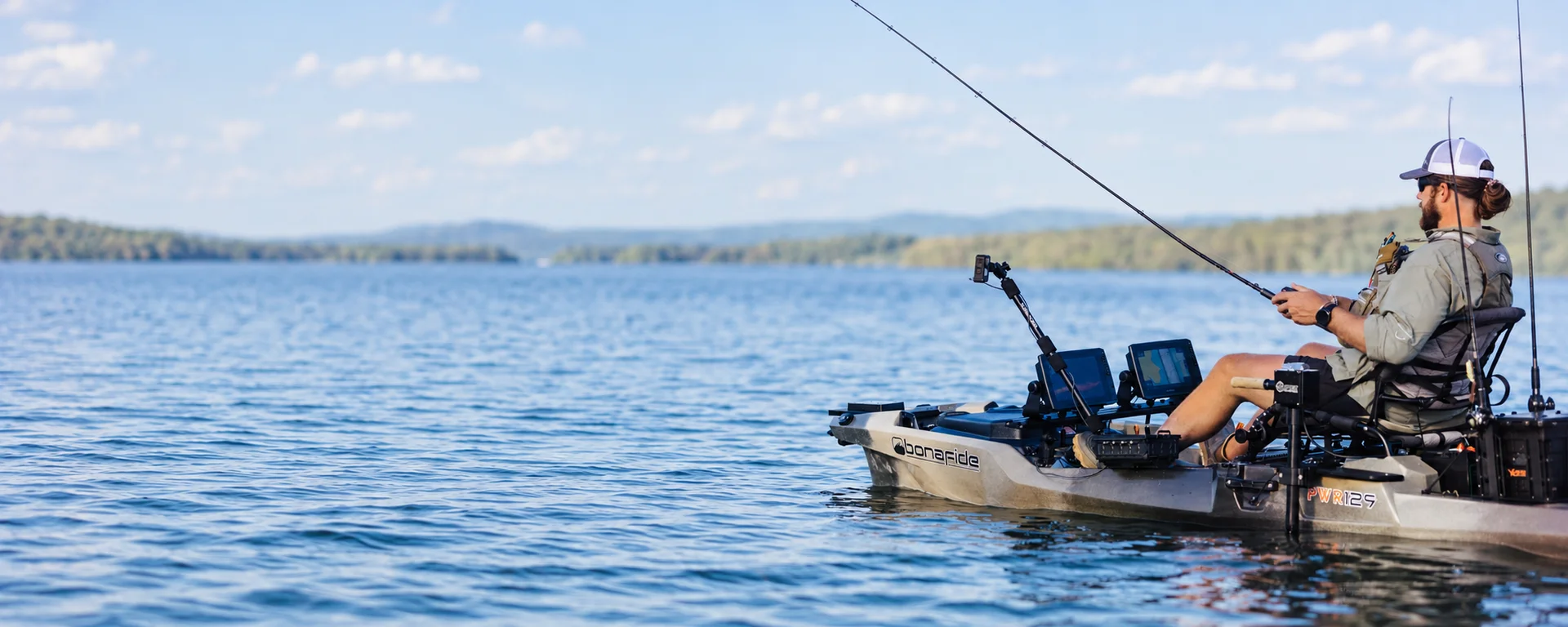Angler in a Bonafide fishing kayak with mounted electronics and rod holders